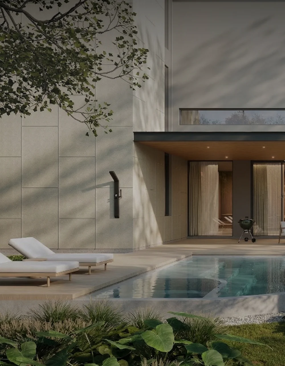 Poolside terrace of a CSRE residence framed by mature trees